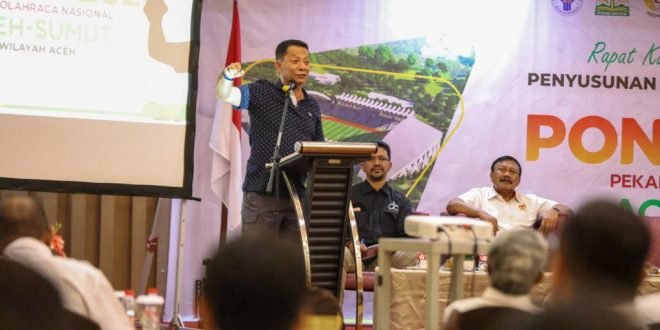 Penjabat Gubernur Aceh, Achmad Marzuki, saat memberi sambutan pada Rapat Koordinsi dan Bimbingan terkait Penyusunan Rencana Induk (Masterplan) Penyelenggaraan PON XXI 2024, di Grand Nanggroe, Banda Aceh, Sabtu, (21/10/2023).